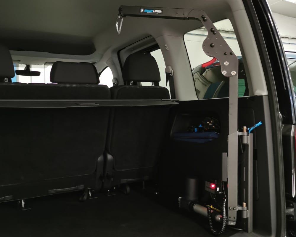 chargeur fauteuil dans véhicule